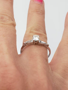 14k White Gold .38ct T.W. Round & Baguette Diamond Three Stone Engagement Ring
